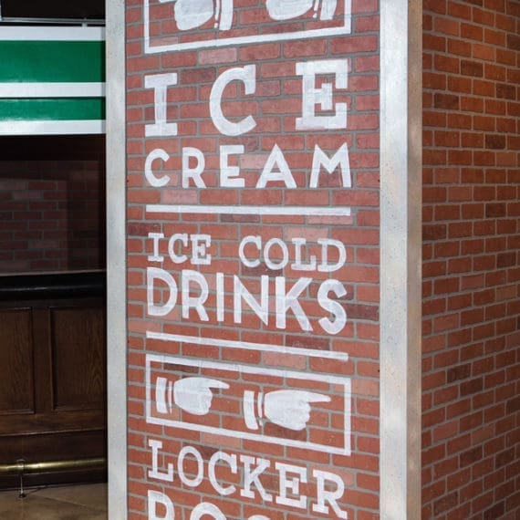 Sign Reading Ice Cream Ice Cold Drinks And Locker Room